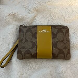 Corner Zip Wristlet In Signature Canvas With Retro Yellow Leather Stripe